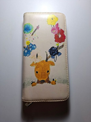 Women's beige wallet with designs like new