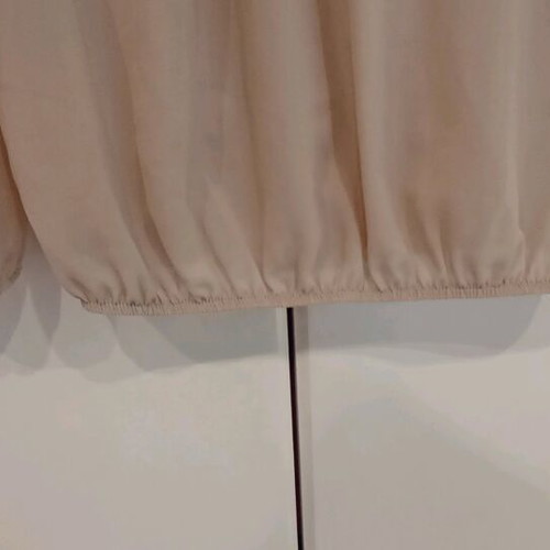 Women's beige top like new, neck tie, elastic cuffs