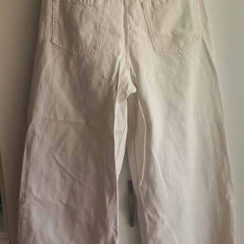 Sinsay white jeans with wide leg and pleated waist, size 40