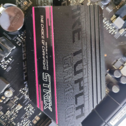 ASUS ROG Strix B550-F Gaming motherboard used, non-functional for repair or parts