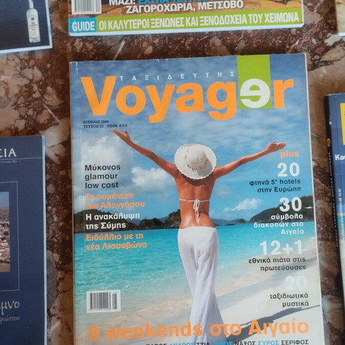Voyager magazines and travel guides used, pack of five magazines and four guides
