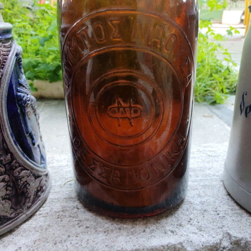 Beer glass and bottle set from Olympos restaurant Naousa like new