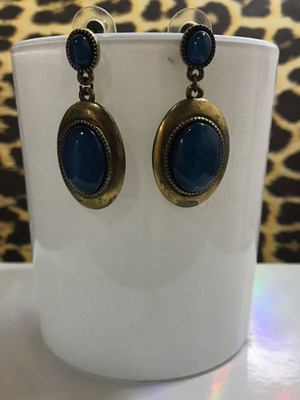 Faux earrings with blue stone used, gold-tone