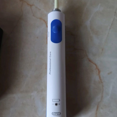 Oral-B Braun Professional Care electric toothbrush used with charger