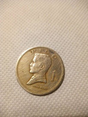 1 Piso coin used from the Philippines featuring Jose Rizal