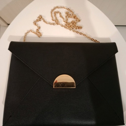 Black bag with gold chain like new