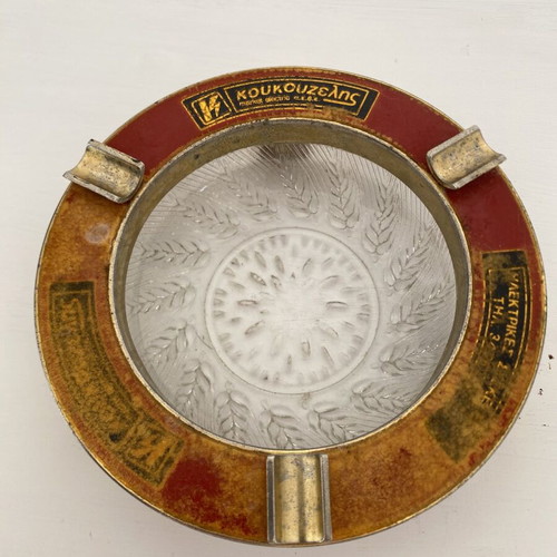 Vintage ashtray used, solid aluminum gold color with glass
