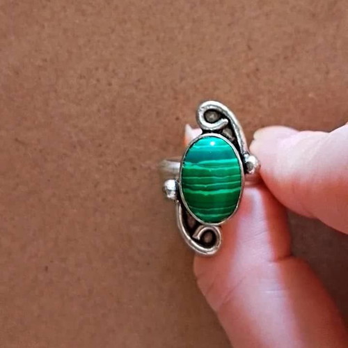 Handmade carved alpaca ring with green stone used