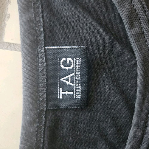 Tag Modest Clothing men's t-shirt XL black like new