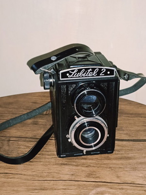 Lubitel 2 vintage camera with leather case and strap