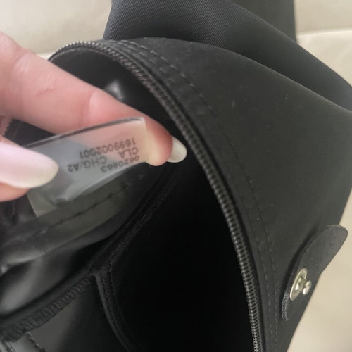 Longchamp Le Pliage backpack used, black, zipper needs replacement