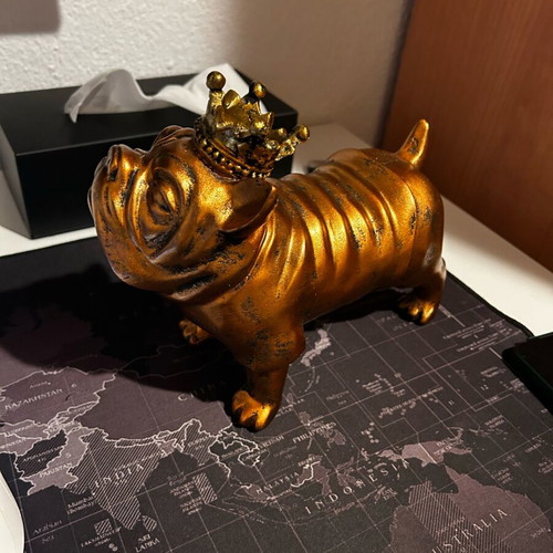 Decorative pitbull dog with crown like new, gold color