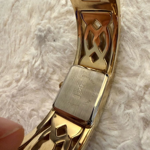 Quo Vadis stainless steel jewelry set in gold tone like new