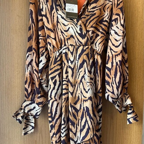 Lynne animal print dress with lining and belt new with tags