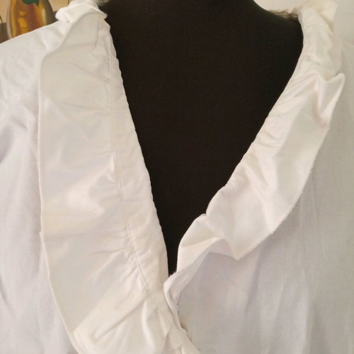 White shirt with ruffles used, size XL