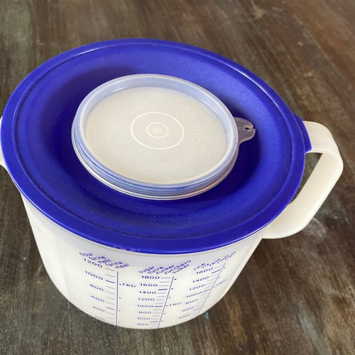 Vintage authentic Tupperware measuring cup unused