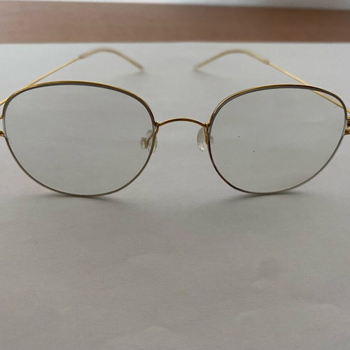 Glasses with ultralight titanium frame gold color, like new