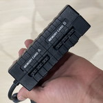PlayStation 2 console with controller, multi tap and cables