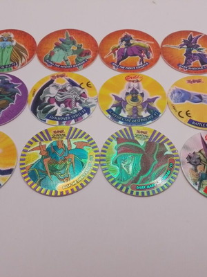 Vintage Yu-Gi-Oh! Tazos set like new, 12 collectible duel tokens