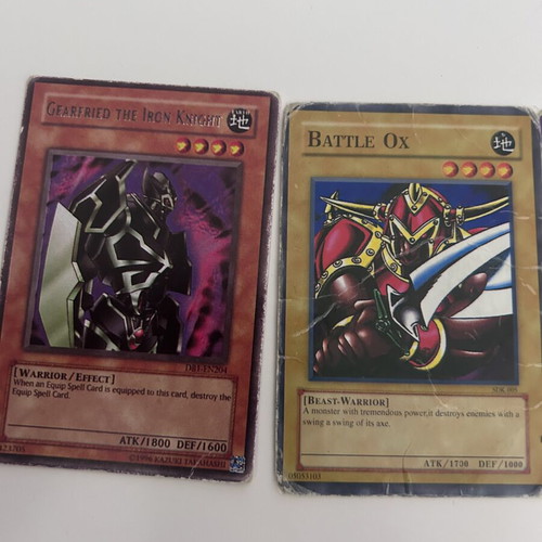 Yu-Gi-Oh! cards set with Flaming Swordsman, Battle Ox, Gearfried the Iron Knight, Three Sisters of Miss Harpy