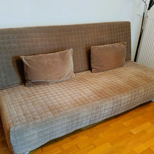 IKEA Beddinge/Nyhamn three-seat sofa bed, brown quilted cover