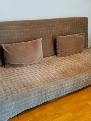 IKEA Beddinge/Nyhamn three-seat sofa bed, brown quilted cover