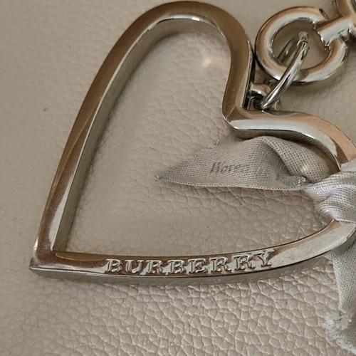 Burberry silver heart bag charm like new