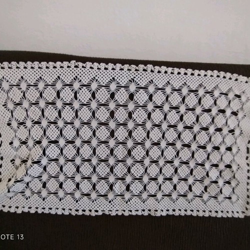 Table linens used, set of two doilies with different designs