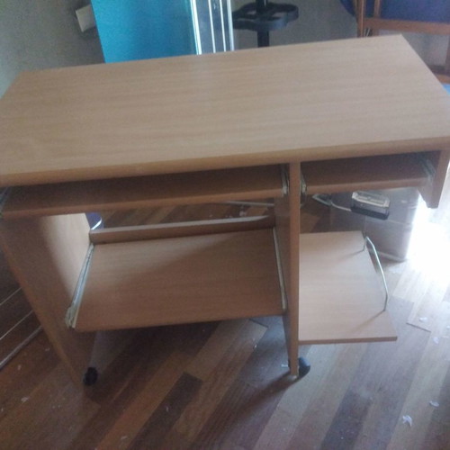 Computer desk with used office chair and wheels