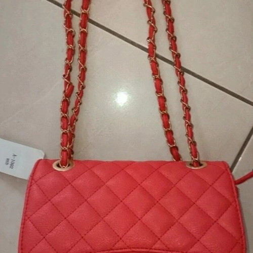 Red small crossbody bag like new with gold details