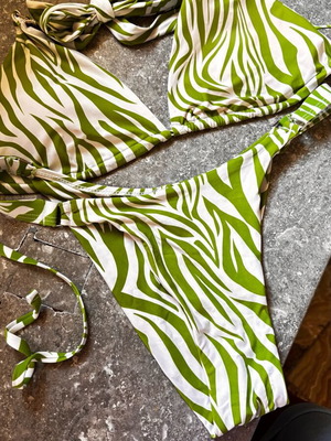 Women's bikini swimsuit used, green and white leopard print, size S/M