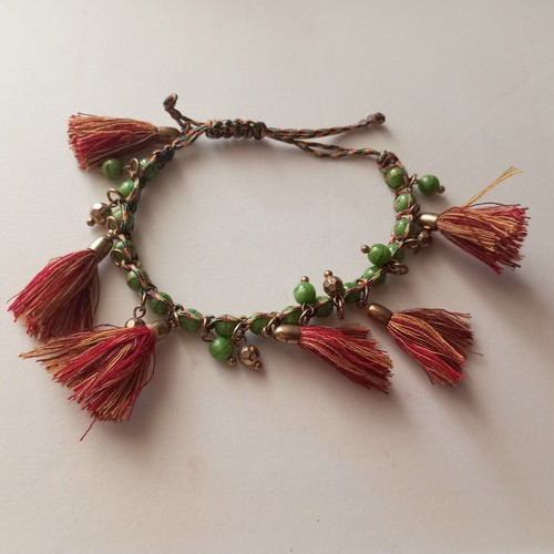 Bracelet new with green beads and red tassels boho style
