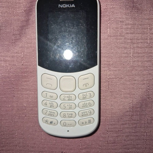 Nokia cell phone used, white, battery needed
