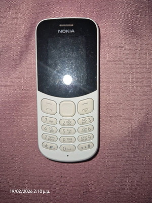 Nokia cell phone used, white, battery needed