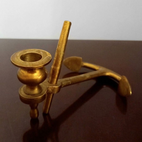 Vintage brass anchor candlestick used with nautical style