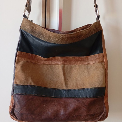 Crossbody bag made of suede used with signs of wear