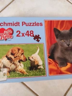 Schmidt puzzle set with 2 designs like new