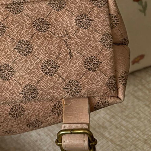Thiros backpack used, nude with signature design