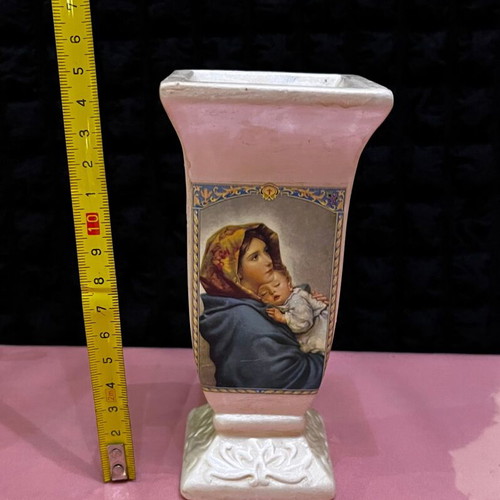 Decorative ceramic candle holder used with Virgin Mary and Christ