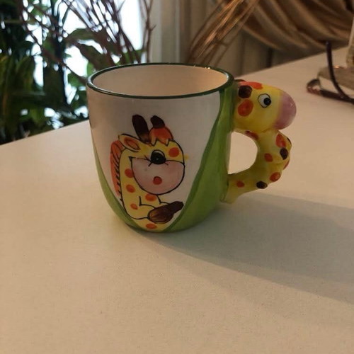 Mug like new with giraffe design