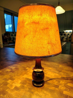 Wooden lamp with warm-colored shade like new
