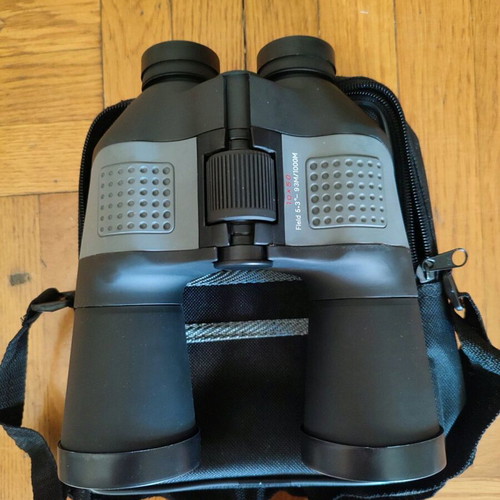 Binoculars new with carrying case, manual and cleaning cloth