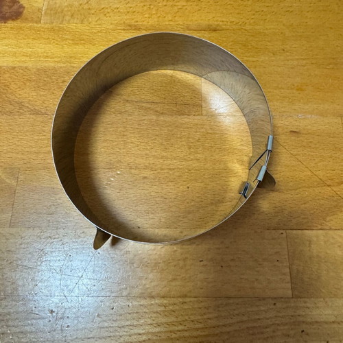 Set of 2 adjustable stainless steel cake rings used