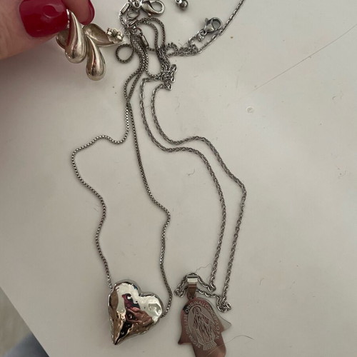 Jewelry set used with 2 necklaces and earrings