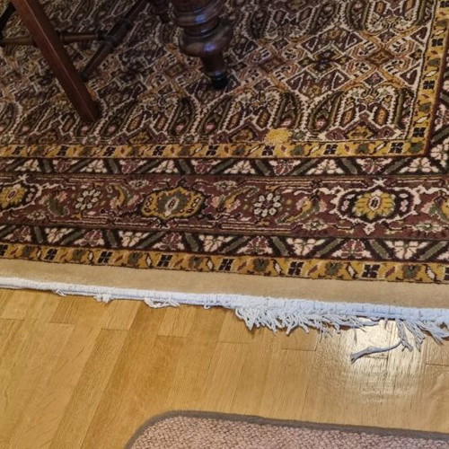 Wool rug authentic used with small patch and missing fringes 3x2.15