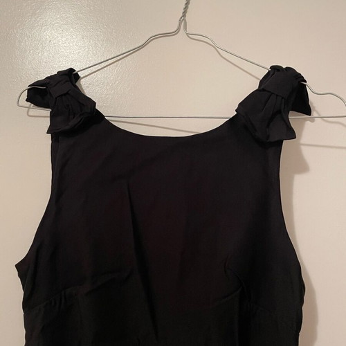 Shine 2gether dress used, black fitted with bows
