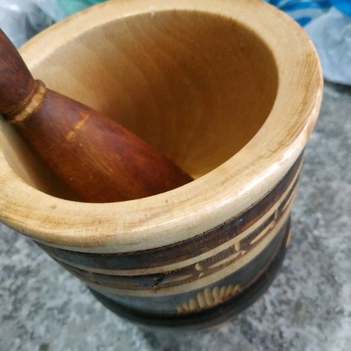 Wooden garlic grater used