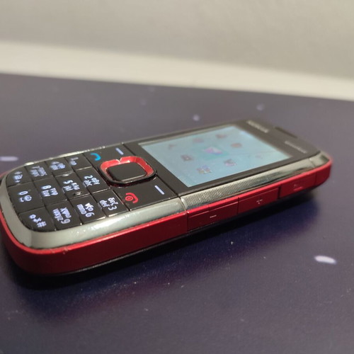 Nokia XpressMusic τηλέφωνο μεταχειρισμένο, σπασμένο τζαμάκι κάμερας, με φορτιστή