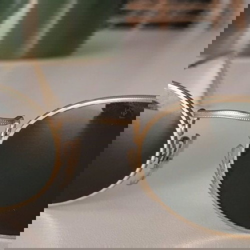 VINTAGE B&L RAY-BAN U.S.A SLEEK SHINY SILVER OVAL AVIATOR SUNGLASSES