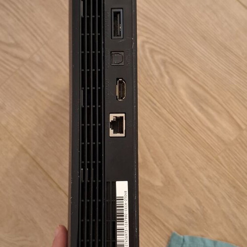 PlayStation 3 Slim console bundle with controllers and games